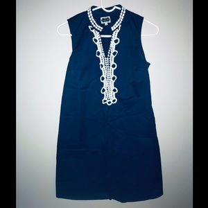 Navy blue dress with white trimming